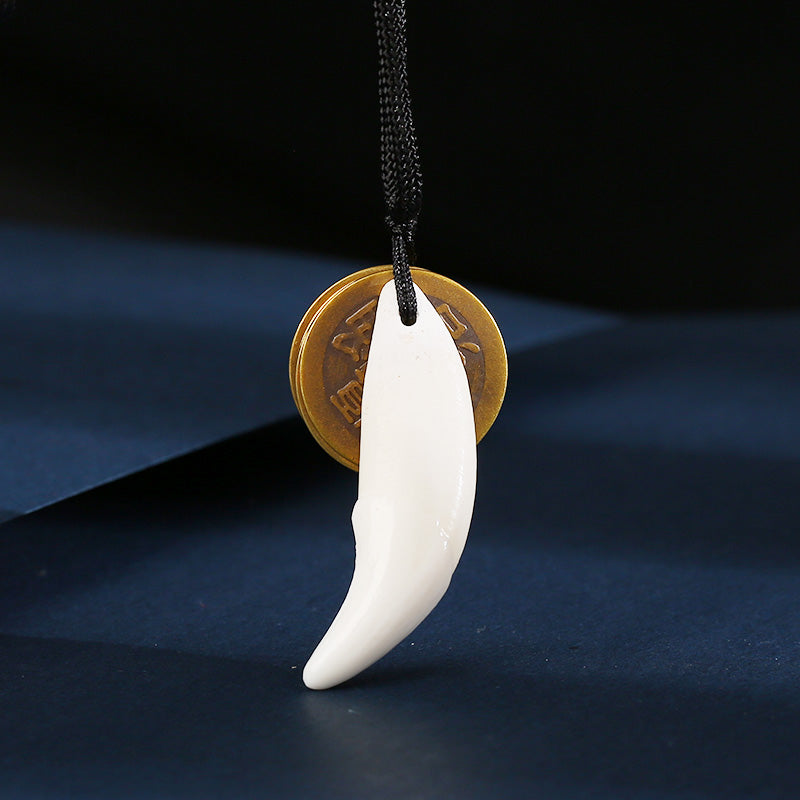 Roaring Sky Dog Black Dog Tooth Pendant