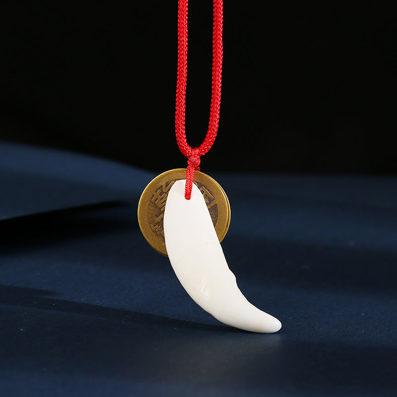 Roaring Sky Dog Black Dog Tooth Pendant
