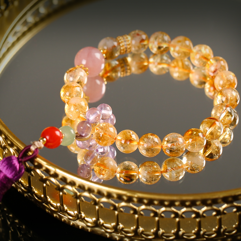 Huang Asai holds a tassel bracelet to attract marriage and good luck