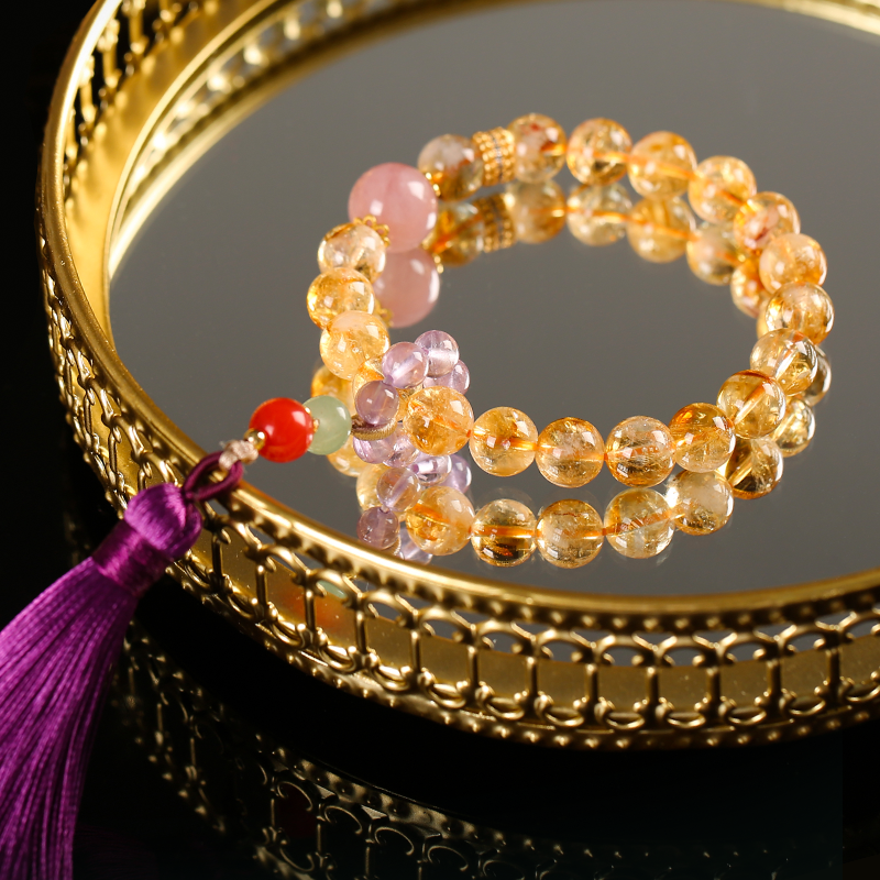 Huang Asai holds a tassel bracelet to attract marriage and good luck