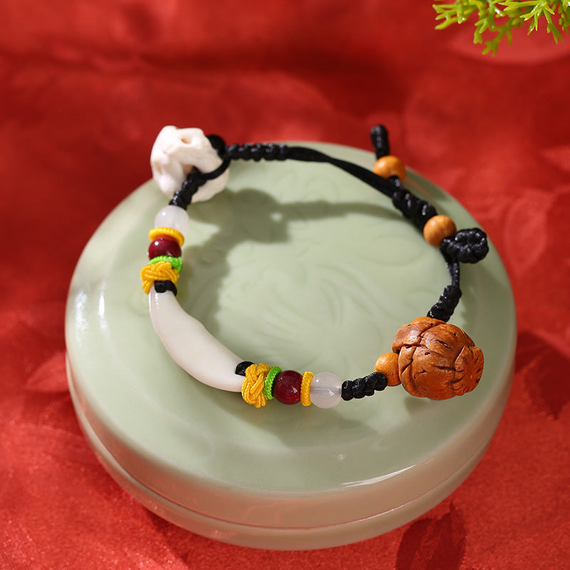 Black dog tooth baby bracelet children's red rope baby hand-woven bracelet out of the shock anklet